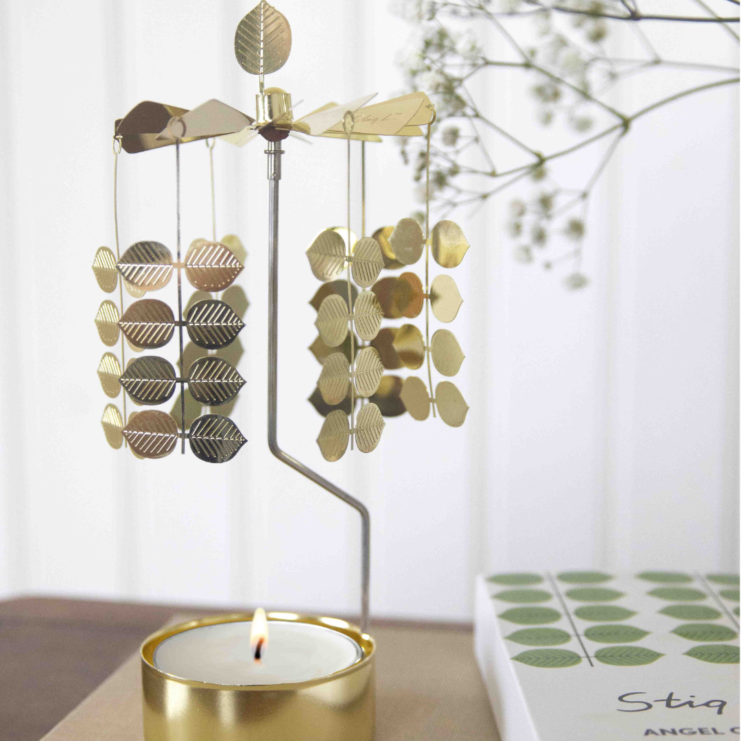 Stig L. Berså änglaspel från Pluto Design AB, mellan